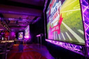 Custom stage design and audio visual purple lighting