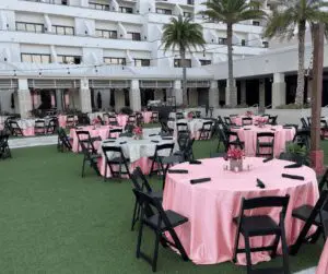 Photo of coral and palm leave overlay with centerpieces in Ft. Lauderdale