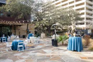 Photo of the Briscoe Western Art Museum with linens, centerpieces and decor for an event - Blue Spark