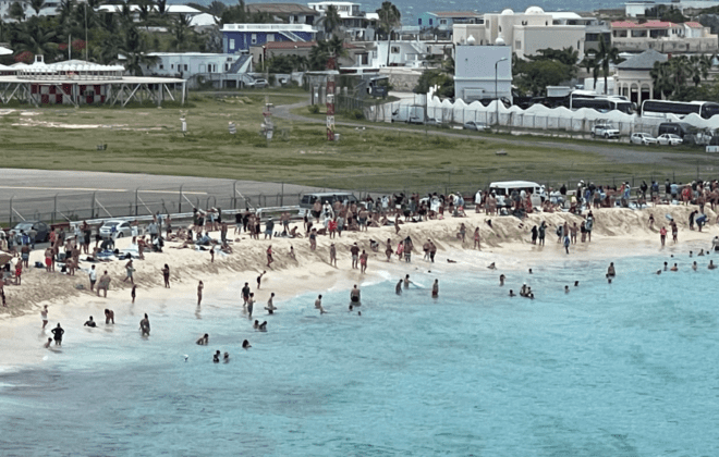 Photo of Guests watching planes on Maho Beach