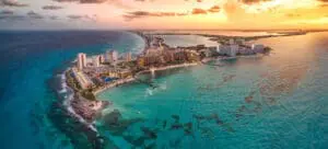 sunset on a Cancun resort with blue water | Blue Spark Event Design