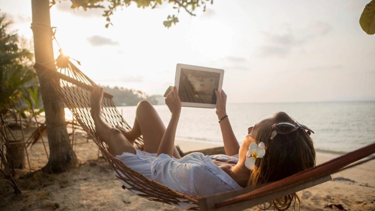 Photo of woman in a hammock on a beach