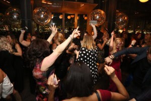 Photo of people dancing at a corporate event