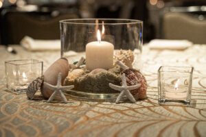 Photo of beach centerpiece with shell enhancements at the Hilton San Diego Bayfront