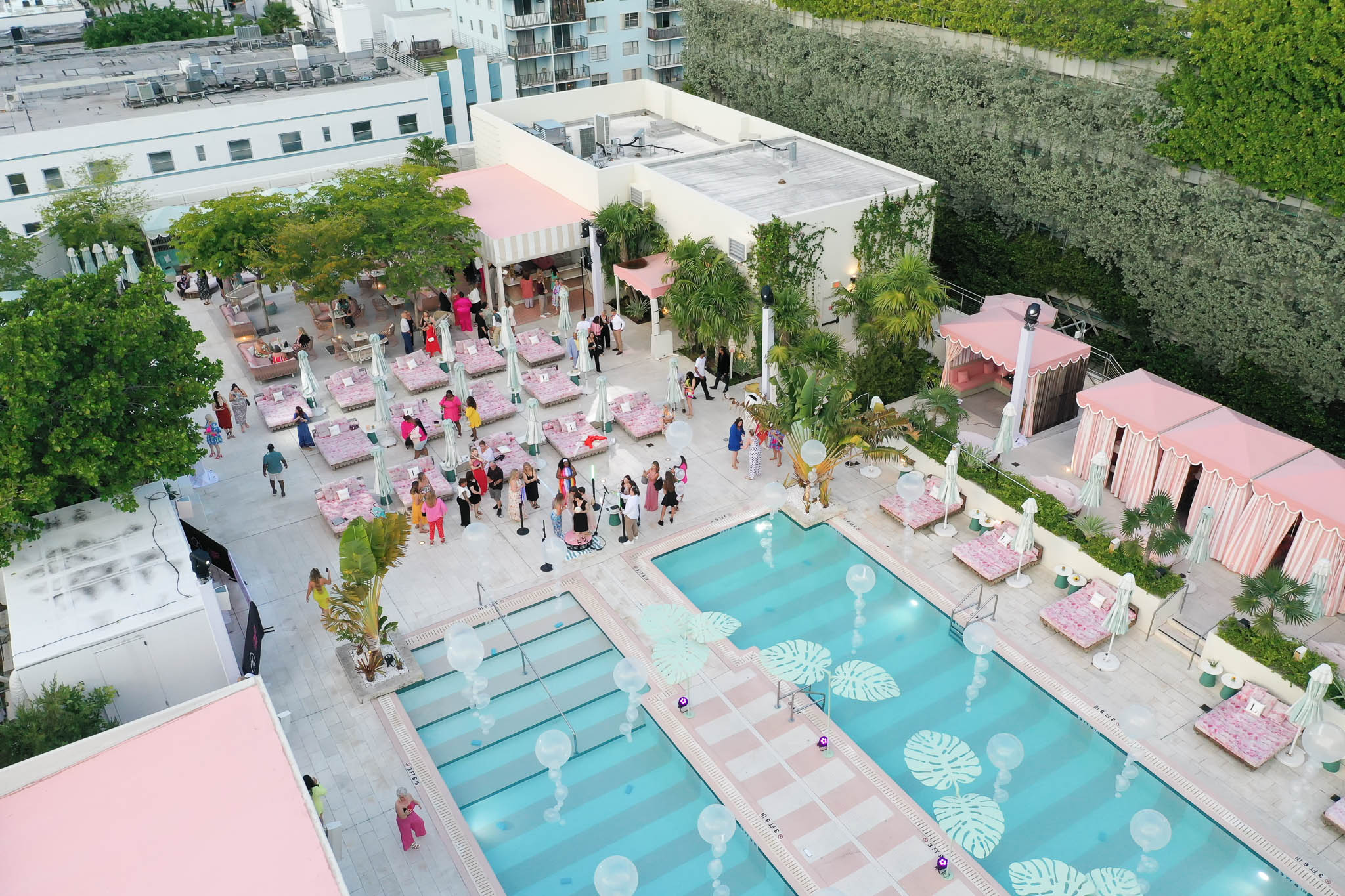 Photo of aerial shot of pool product launch Blue Spark Event Design - Miami