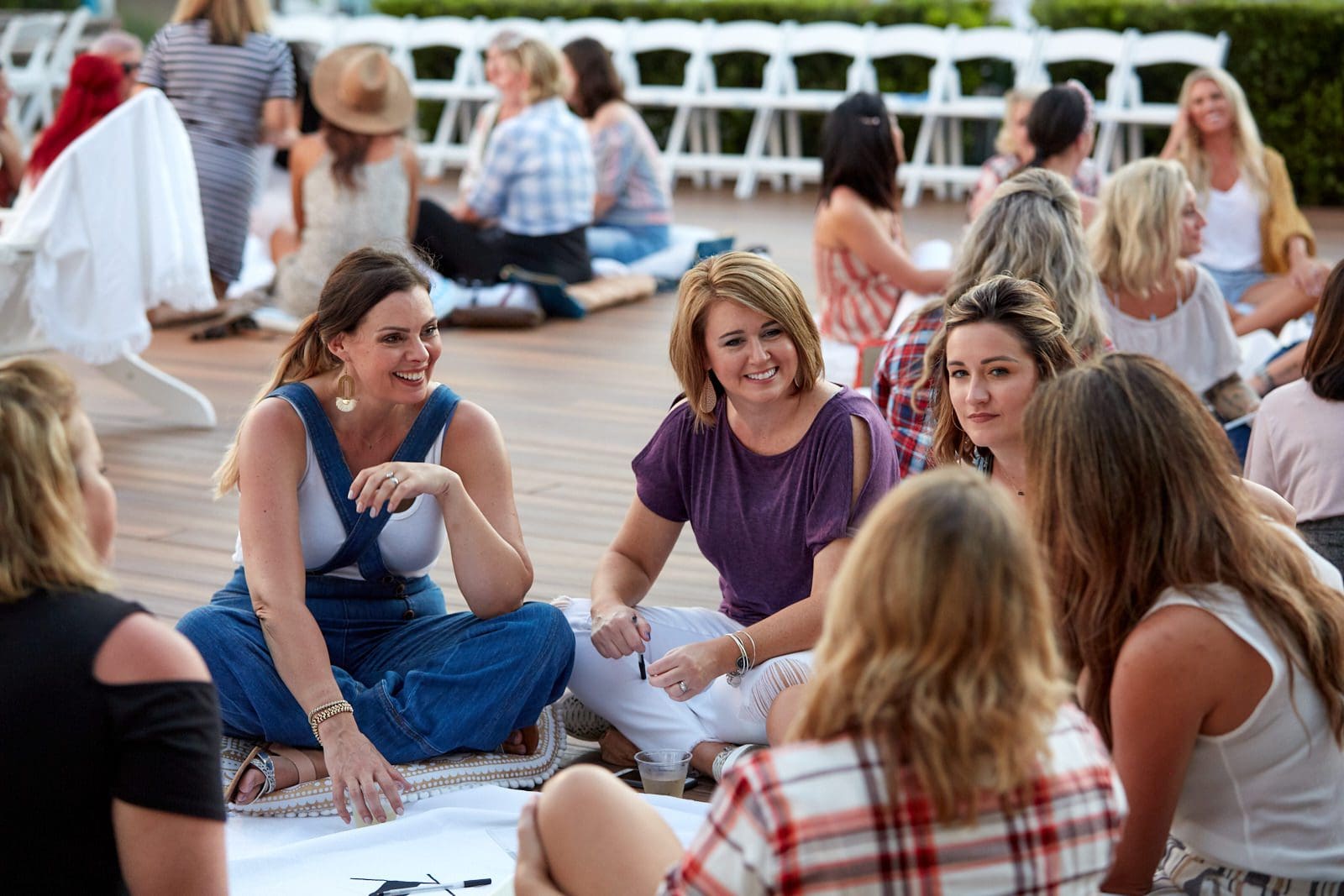 Photo of Teambuilding, ladies sitting in circle on ground