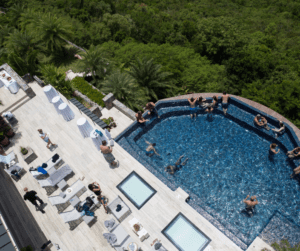 Board Retreat (Incentive-style) in the Virgin Islands, guests enjoying the private mansion rental for the day. Swimming and lounging.